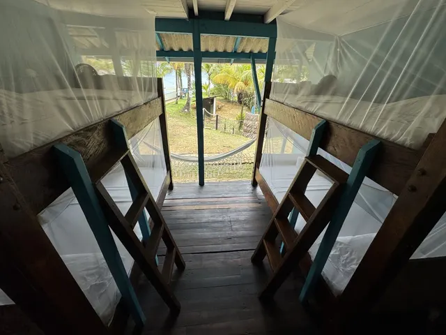 Cama en dormitorio mixto · Fotografía 2
