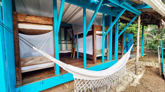 Cama en dormitorio mixto · Fotografía 4