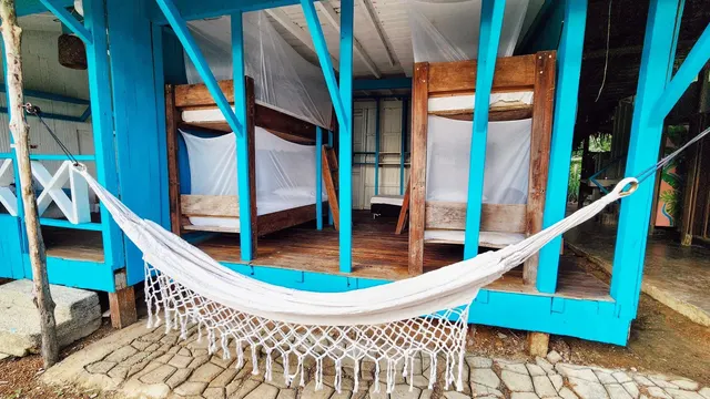 Cama en dormitorio mixto · Fotografía 5